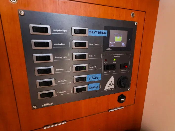  Yacht Photos Pics Control panel of a 2020 J Boats J/99 sailboat with labeled switches and display.