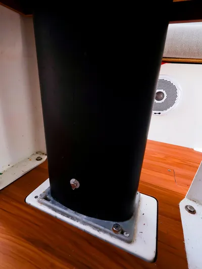  Yacht Photos Pics Interior view of 2020 J Boats J/99 sailboat, featuring mast support and speaker.