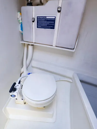  Yacht Photos Pics Interior of 2020 J Boats J/99 showing compact marine toilet setup.