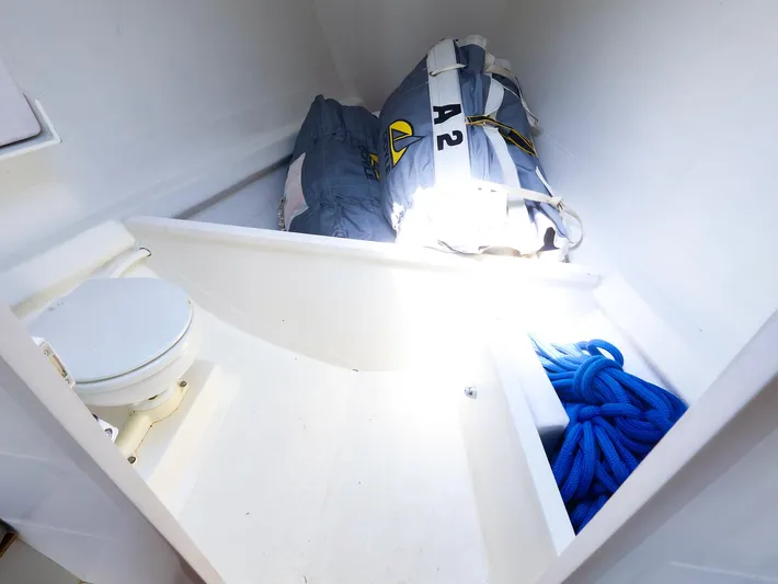  Yacht Photos Pics Interior of 2020 J Boats J/99 showing storage area with ropes and sails.