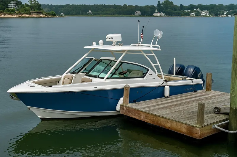 Luna Sea Yacht Photos Pics 2023 Pursuit DC 266 Dual Console boat docked on calm water.