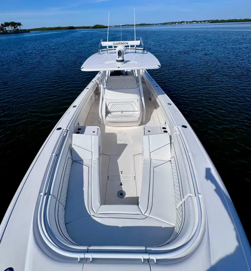 Herediterry Yacht Photos Pics 2017 Intrepid 375 FE boat with spacious deck and Garmin equipment on calm water.