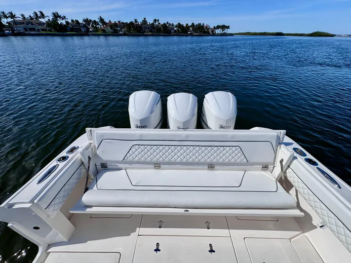 Herediterry Yacht Photos Pics 2017 Intrepid 375 FE boat with triple engines on calm water.