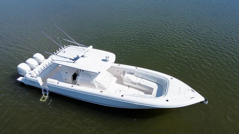Herediterry Yacht Photos Pics 2017 Intrepid 375 FE boat on calm water, aerial view.