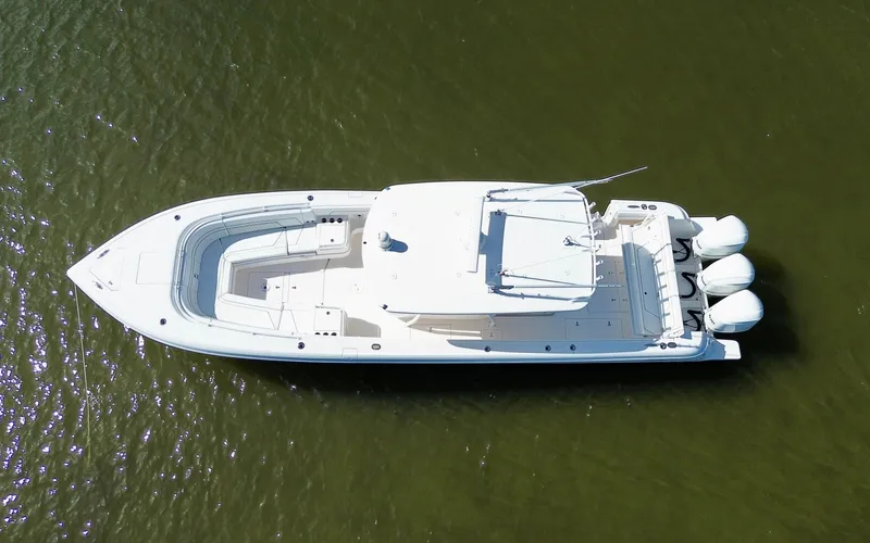 Herediterry Yacht Photos Pics Aerial view of 2017 Intrepid 375 FE boat on calm water.
