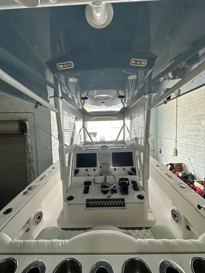  Yacht Photos Pics 2025 Invincible 36 Open boat interior with advanced navigation controls and sleek design.