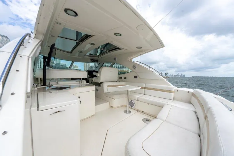  Yacht Photos Pics 2009 Sea Ray 43 Sundancer yacht interior with white seating and ocean view.