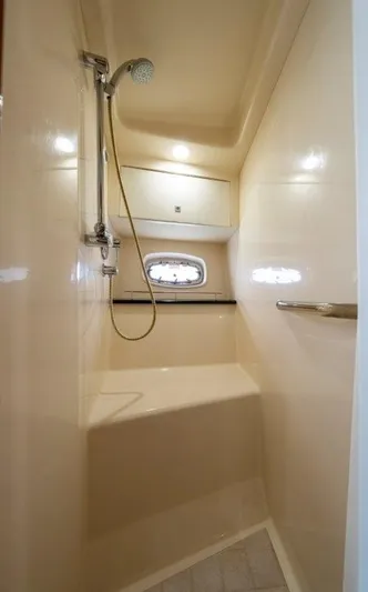  Yacht Photos Pics Shower area in 2009 Sea Ray 43 Sundancer yacht with built-in seat and handheld showerhead.