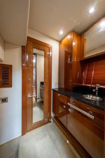  Yacht Photos Pics Luxurious 2009 Sea Ray 43 Sundancer yacht interior with sleek wood finishes and modern amenities.