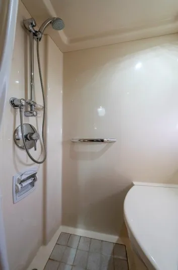  Yacht Photos Pics Shower area in 2009 Sea Ray 43 Sundancer yacht, featuring modern fixtures and sleek design.