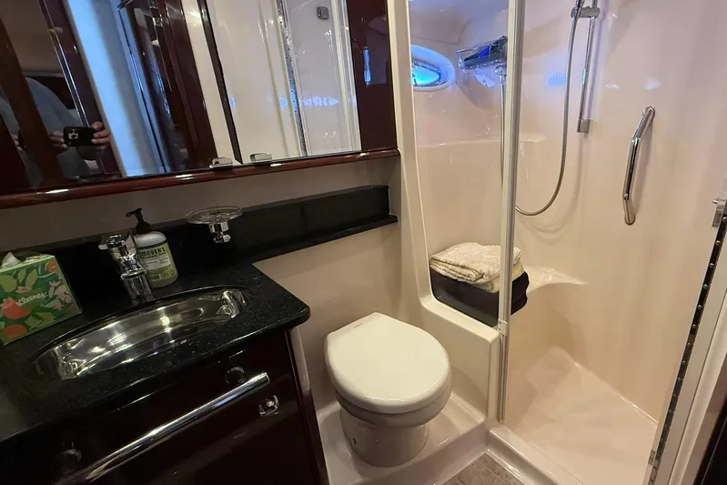 O Sea D Yacht Photos Pics Luxurious bathroom in 2010 Sea Ray 520 Sedan Bridge yacht with shower and sink.