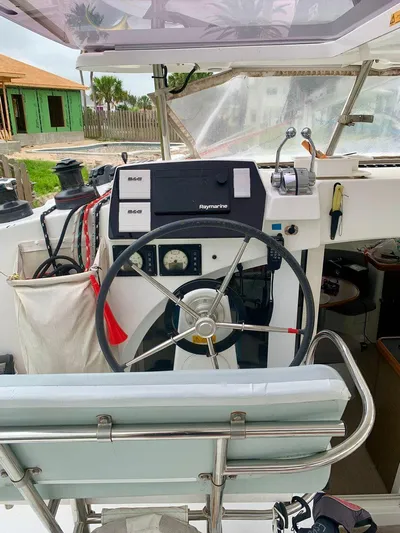 Esperanza Yacht Photos Pics Steering wheel and controls of a 2019 Lagoon 380 S2 4/2 catamaran.