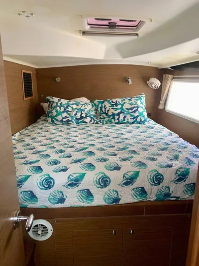 Esperanza Yacht Photos Pics Cozy bedroom in 2019 Lagoon 380 S2 yacht with seashell-themed bedding.