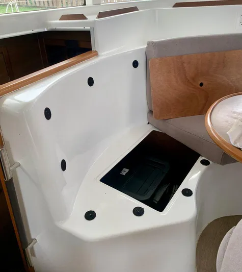 Esperanza Yacht Photos Pics Interior of 2019 Lagoon 380 S2 4/2 catamaran with seating and storage.