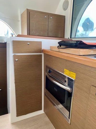 Esperanza Yacht Photos Pics Interior of 2019 Lagoon 380 S2 4/2 yacht with modern kitchen cabinetry.
