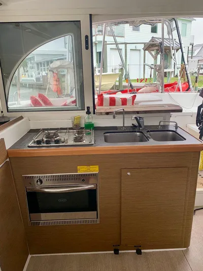 Esperanza Yacht Photos Pics 2019 Lagoon 380 S2 4/2 yacht kitchen with stove, oven, and dual sinks.