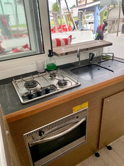 Esperanza Yacht Photos Pics 2019 Lagoon 380 S2 4/2 yacht kitchen with stove and sink.