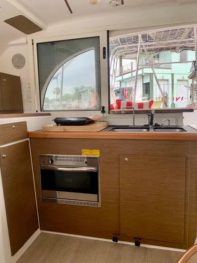 Esperanza Yacht Photos Pics Interior of 2019 Lagoon 380 S2 4/2 yacht kitchen with oven and sink.
