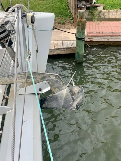 Esperanza Yacht Photos Pics 2019 Lagoon 380 S2 4/2 catamaran docked with anchor visible.