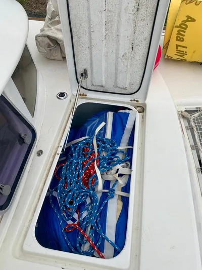 Esperanza Yacht Photos Pics Open storage compartment on 2019 Lagoon 380 S2 4/2 with ropes and equipment.