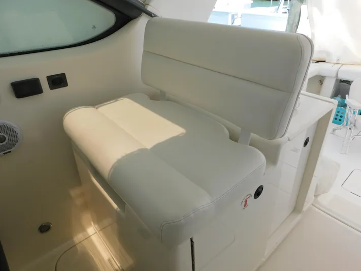 Cap & Dan Yacht Photos Pics 2001 Tiara Yachts 3800 Open interior seating, white upholstery, modern design.