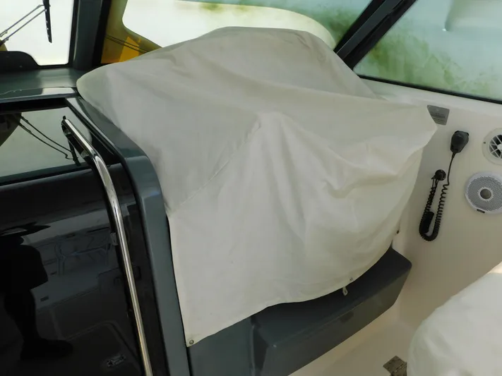 Cap & Dan Yacht Photos Pics Covered helm station on a 2001 Tiara Yachts 3800 Open boat.