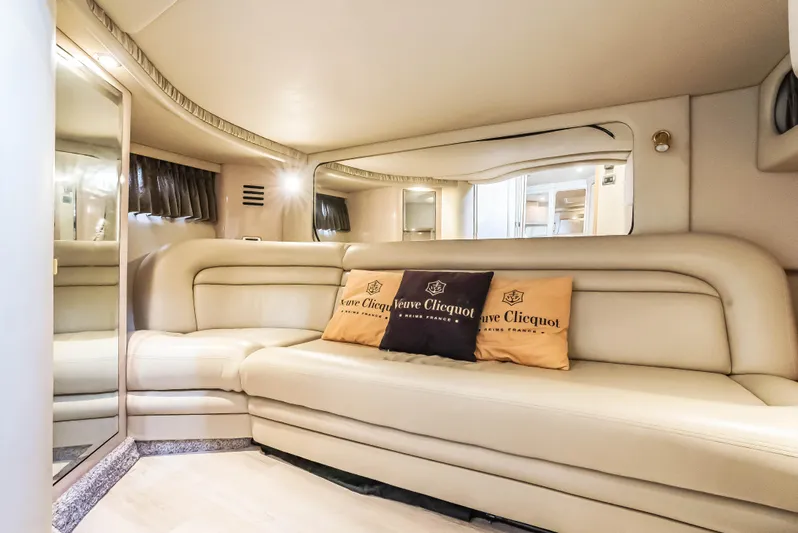 Decadance Yacht Photos Pics Luxurious interior of 2003 Sea Ray 460 Sundancer yacht with cream leather seating.
