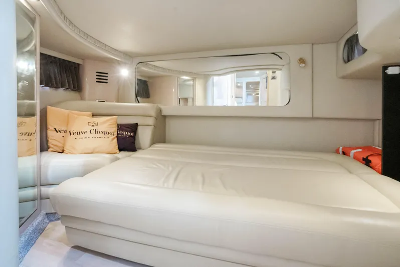 Decadance Yacht Photos Pics Luxurious interior cabin of 2003 Sea Ray 460 Sundancer yacht with plush bedding.