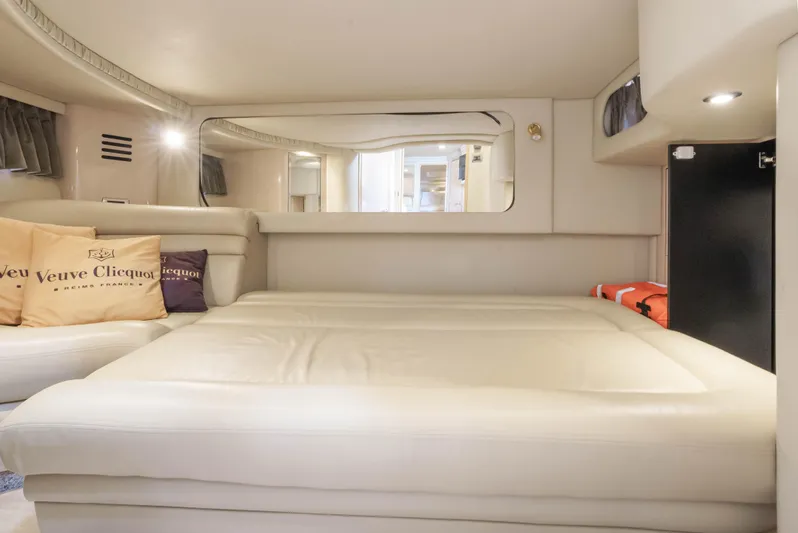 Decadance Yacht Photos Pics Luxurious interior cabin of 2003 Sea Ray 460 Sundancer yacht with plush bedding.