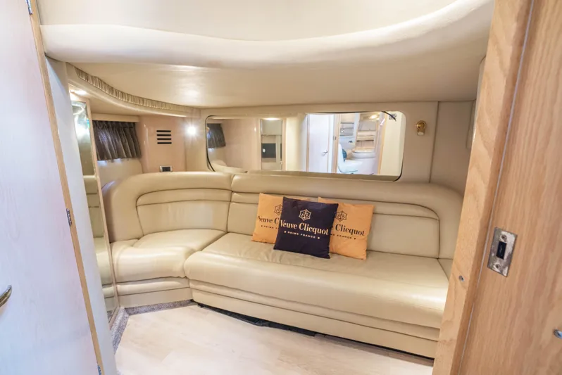 Decadance Yacht Photos Pics Luxurious interior of 2003 Sea Ray 460 Sundancer yacht with beige leather seating.