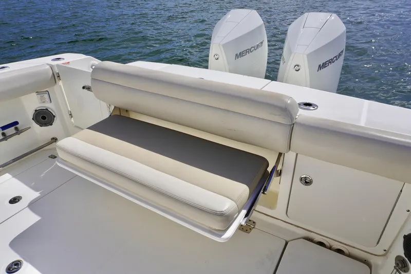 Vasea Yacht Photos Pics 2021 Boston Whaler 330 Outrage boat with foldable seating and twin Mercury engines.