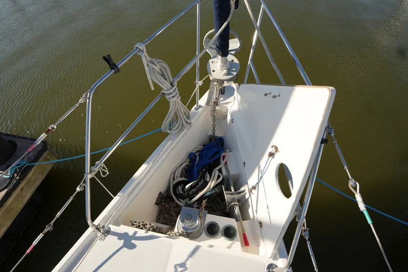 Summer Breeze Yacht Photos Pics Bow of 2002 Catalina 42 Mark II sailboat with anchor and ropes.
