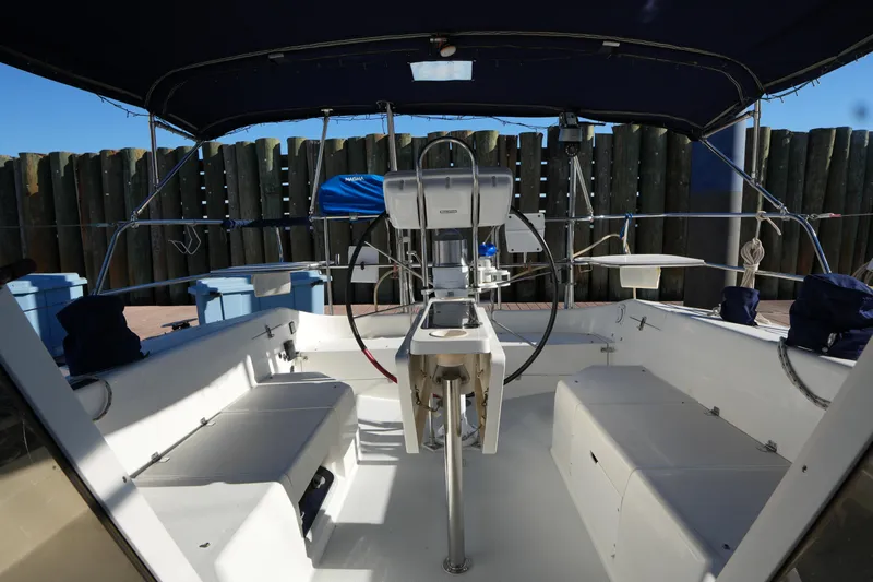 Summer Breeze Yacht Photos Pics Cockpit of 2002 Catalina 42 Mark II sailboat with steering wheel and seating.