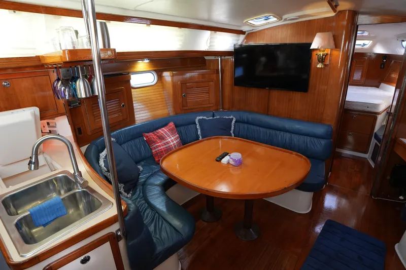 Summer Breeze Yacht Photos Pics Interior of 2002 Catalina 42 Mark II yacht with cozy seating and modern amenities.