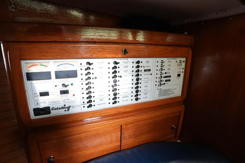 Summer Breeze Yacht Photos Pics Electrical control panel inside a 2002 Catalina 42 Mark II yacht cabin.