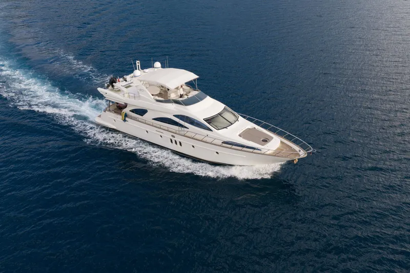 Senior S Yacht Photos Pics 2004 Azimut 80 yacht cruising on open water, aerial view.