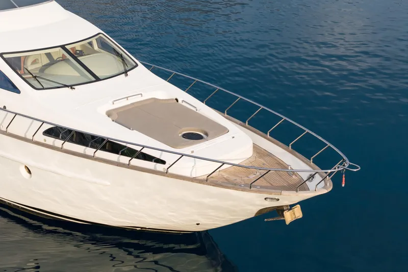 Senior S Yacht Photos Pics Luxury Azimut 80 yacht from 2004 on calm blue water.