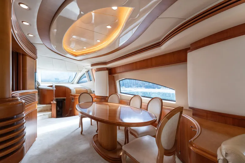 Senior S Yacht Photos Pics Luxurious interior of 2004 Azimut 80 yacht with elegant dining area and modern design.