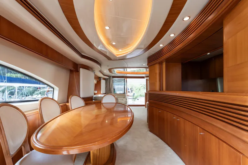 Senior S Yacht Photos Pics Luxurious interior of 2004 Azimut 80 yacht with elegant wood finishes and modern design.