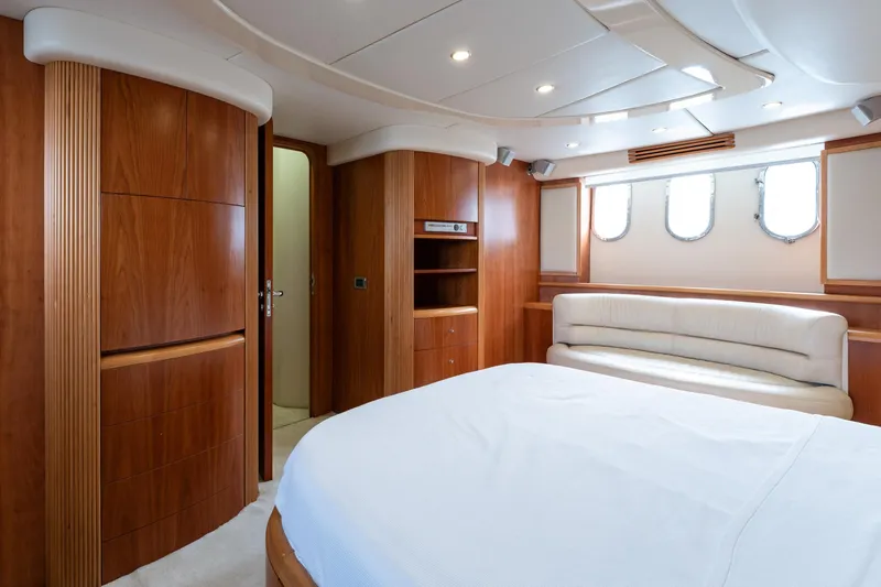 Senior S Yacht Photos Pics Luxurious interior of 2004 Azimut 80 yacht with wood paneling and elegant furnishings.