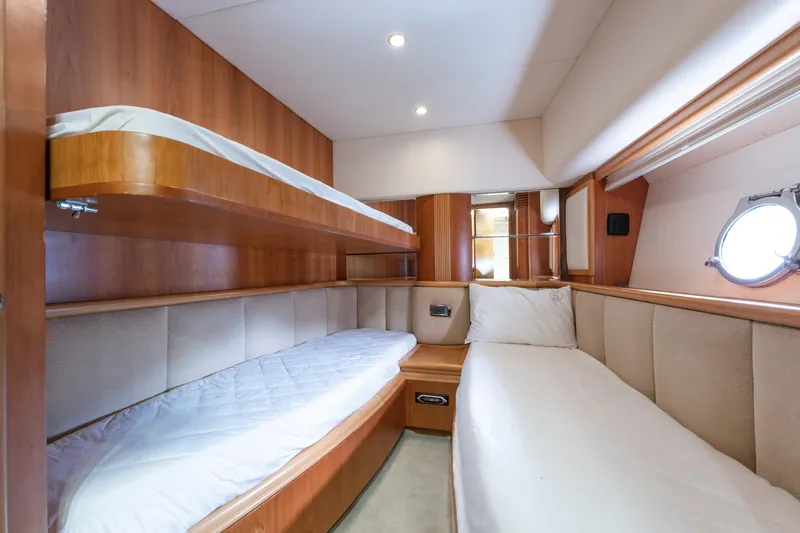 Senior S Yacht Photos Pics Luxurious cabin interior of 2004 Azimut 80 yacht with twin beds and wooden finish.