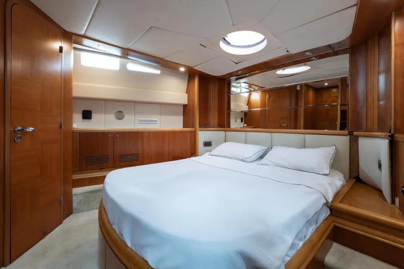Senior S Yacht Photos Pics Luxurious 2004 Azimut 80 yacht bedroom with elegant wood finishes and modern design.