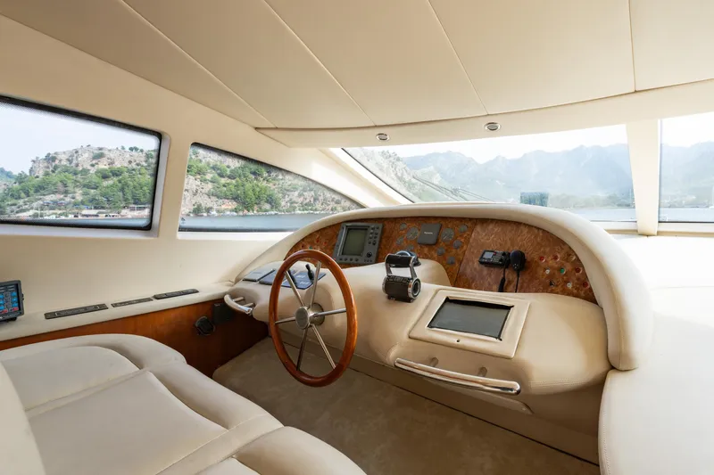 Senior S Yacht Photos Pics Luxurious helm of 2004 Azimut 80 yacht with scenic ocean view.