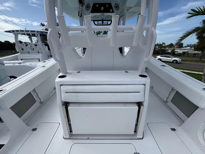  Yacht Photos Pics 2025 Sportsman Open 322 Center Console boat interior with seating and storage.