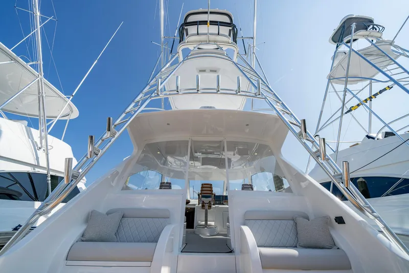 Pamela Yacht Photos Pics 2024 Viking 48 Sport Tower yacht with sleek design and luxurious seating.