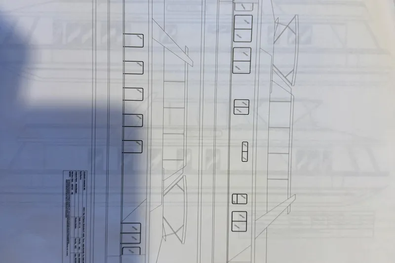  Yacht Photos Pics Blueprint of a 2004 Stardust Cruisers houseboat, showcasing side elevation and window layout.