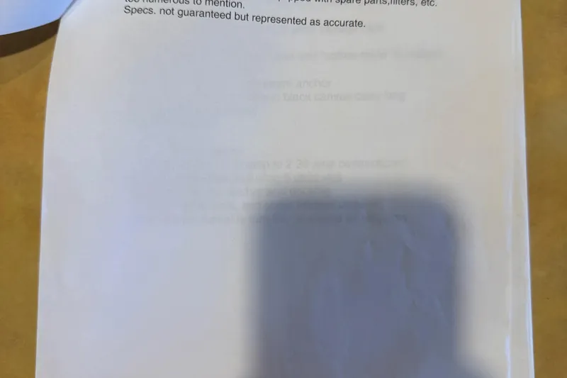  Yacht Photos Pics Blurred document with shadow, featuring text about a 2004 Stardust Cruisers houseboat.