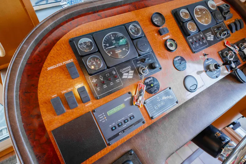  Yacht Photos Pics Control panel of a 2004 Stardust Cruisers houseboat with various gauges and switches.