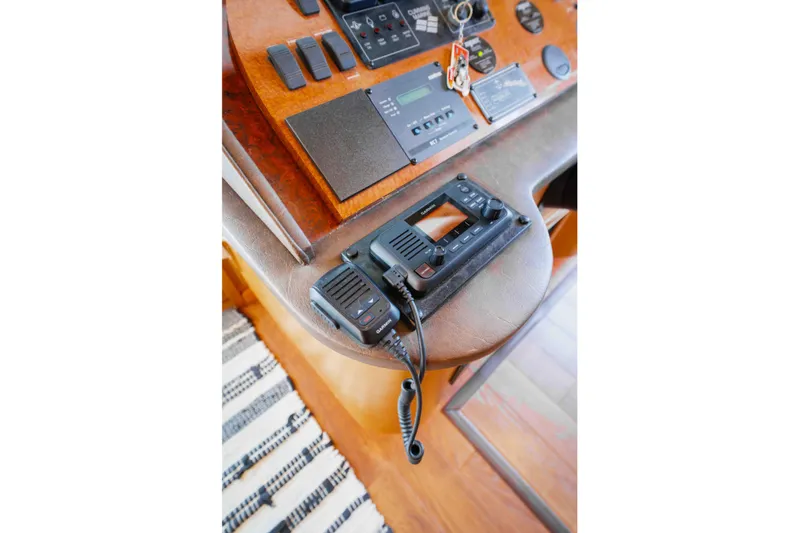  Yacht Photos Pics Control panel of a 2004 Stardust Cruisers houseboat with communication equipment.