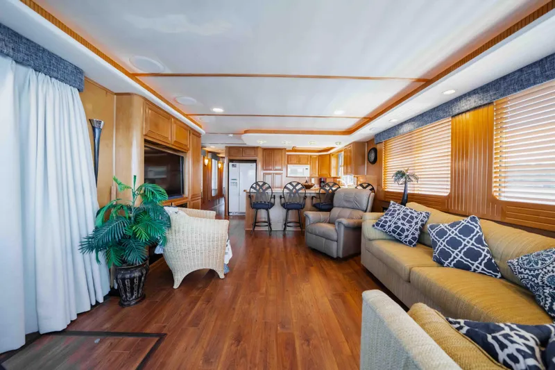  Yacht Photos Pics Luxurious 2004 Stardust Cruisers houseboat interior with elegant furnishings and modern kitchen.